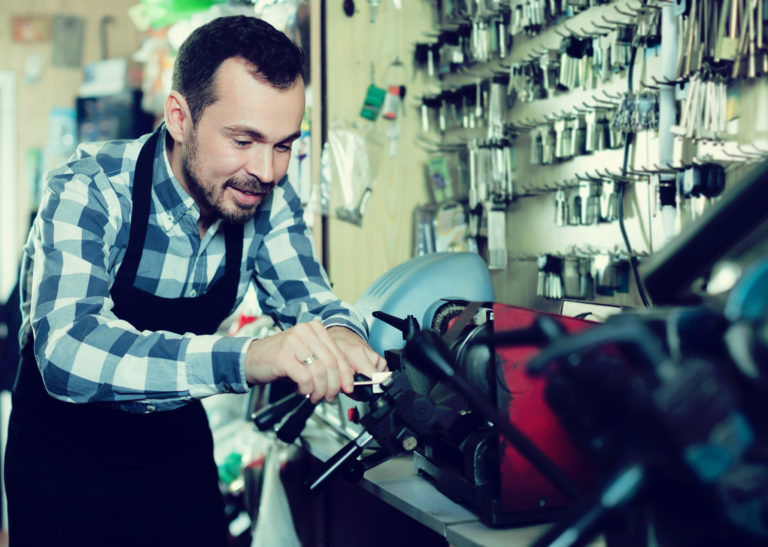 key systems technician ensure warehouse security with professional industrial locksmith services in estero, fl